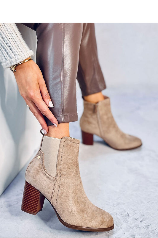 Close-up of Inello women's eco-suede heel boots featuring a stylish design with a soft fur interior and practical zipper, perfect for elegant occasions.