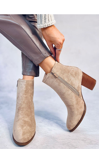 Side view of sophisticated women's heel boots by Inello crafted from eco-suede with a chic 8 cm heel and soft fur lining for ultimate comfort.
