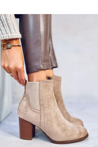 Stylish women's eco-suede heel boots with luxurious fur lining by Inello, ideal for adding elegance to any outfit.