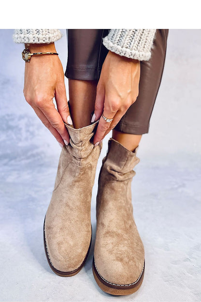 Elegant women's eco-suede boots with fashionable creased upper by Inello, lined with plush fur for warmth and comfort.