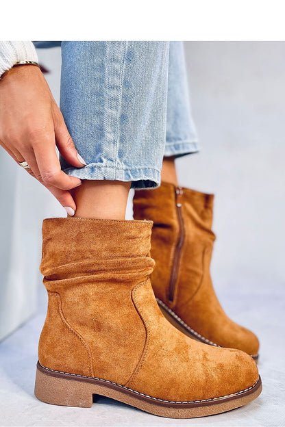 Close-up view of Inello's eco-suede women's boots with soft fur interior, showcasing their premium quality and sophisticated design.