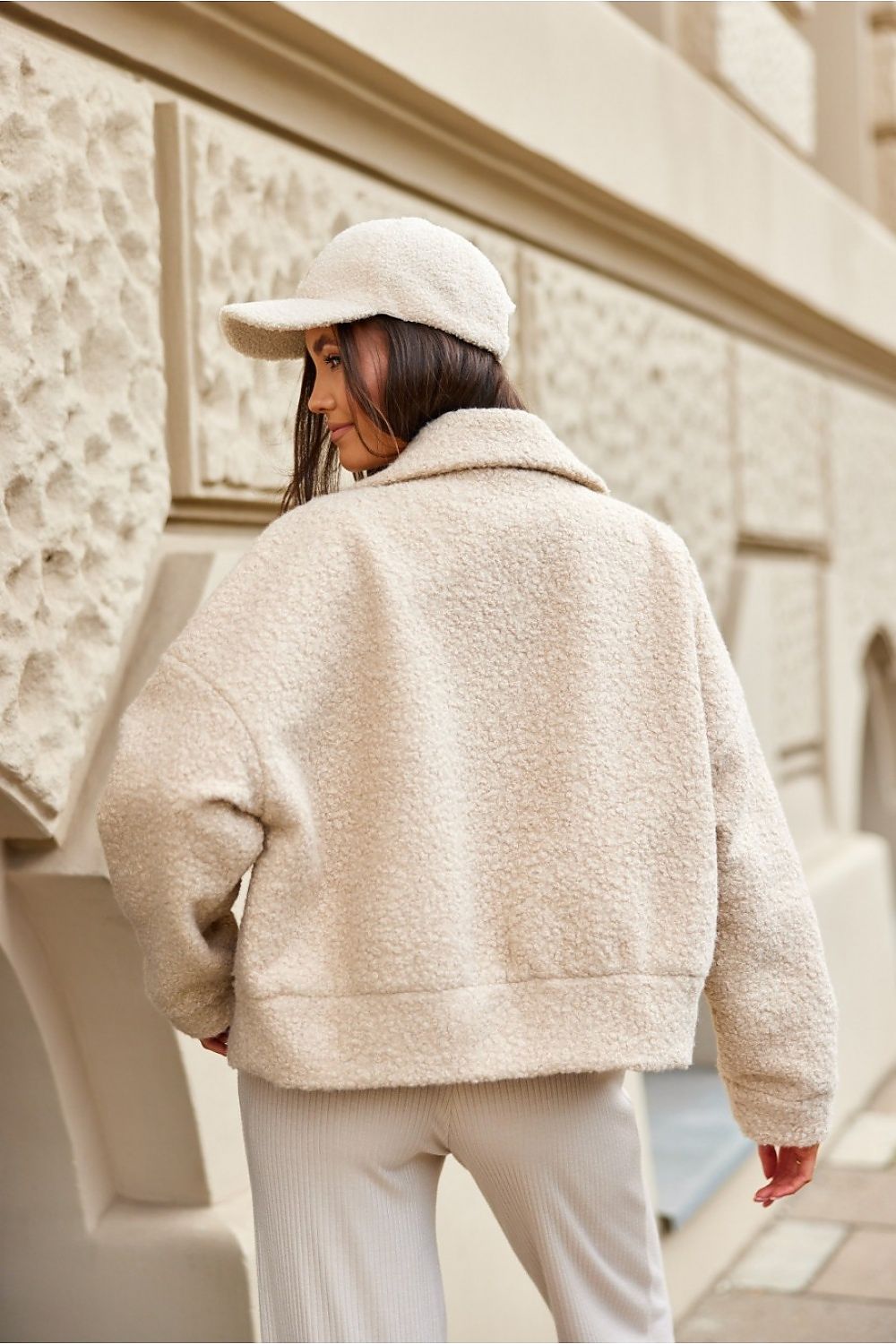 Roco Fashion women's short buttoned jacket styled for a chic autumn look, combining comfort with sophisticated design.