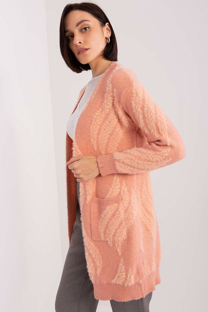 Luxurious long sleeve cardigan by AT, featuring variegated fabric and convenient pockets, perfect for everyday elegance.