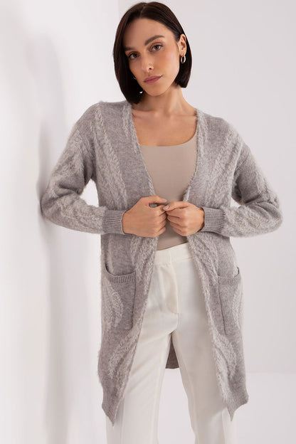 Elegant long sleeve bedspread cardigan from AT, combining fashion and functionality with its pockets and versatile variegated fabric.