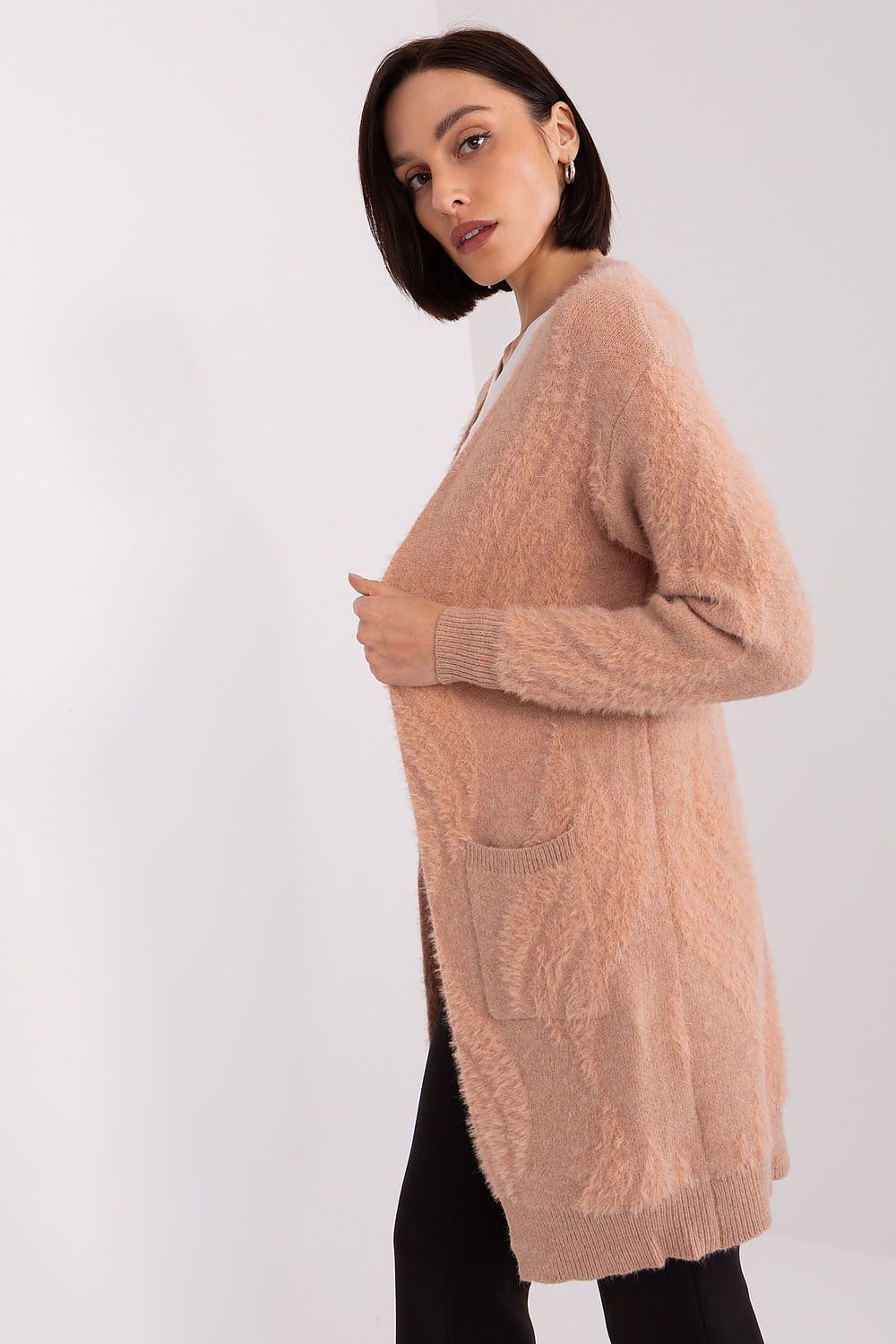 Comfortable long sleeve cardigan with slip pockets by AT, featuring a chic variegated fabric ideal for casual wear.
