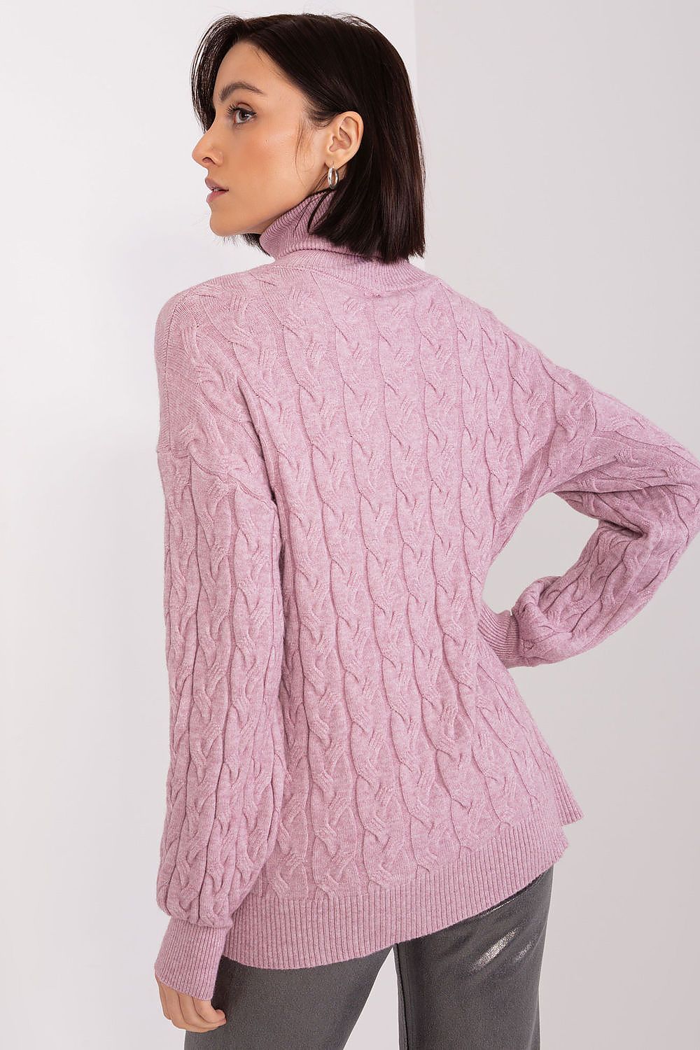 Sophisticated and warm plaid long sleeve turtleneck sweater by AT, perfect for layering in a fashionable winter outfit.