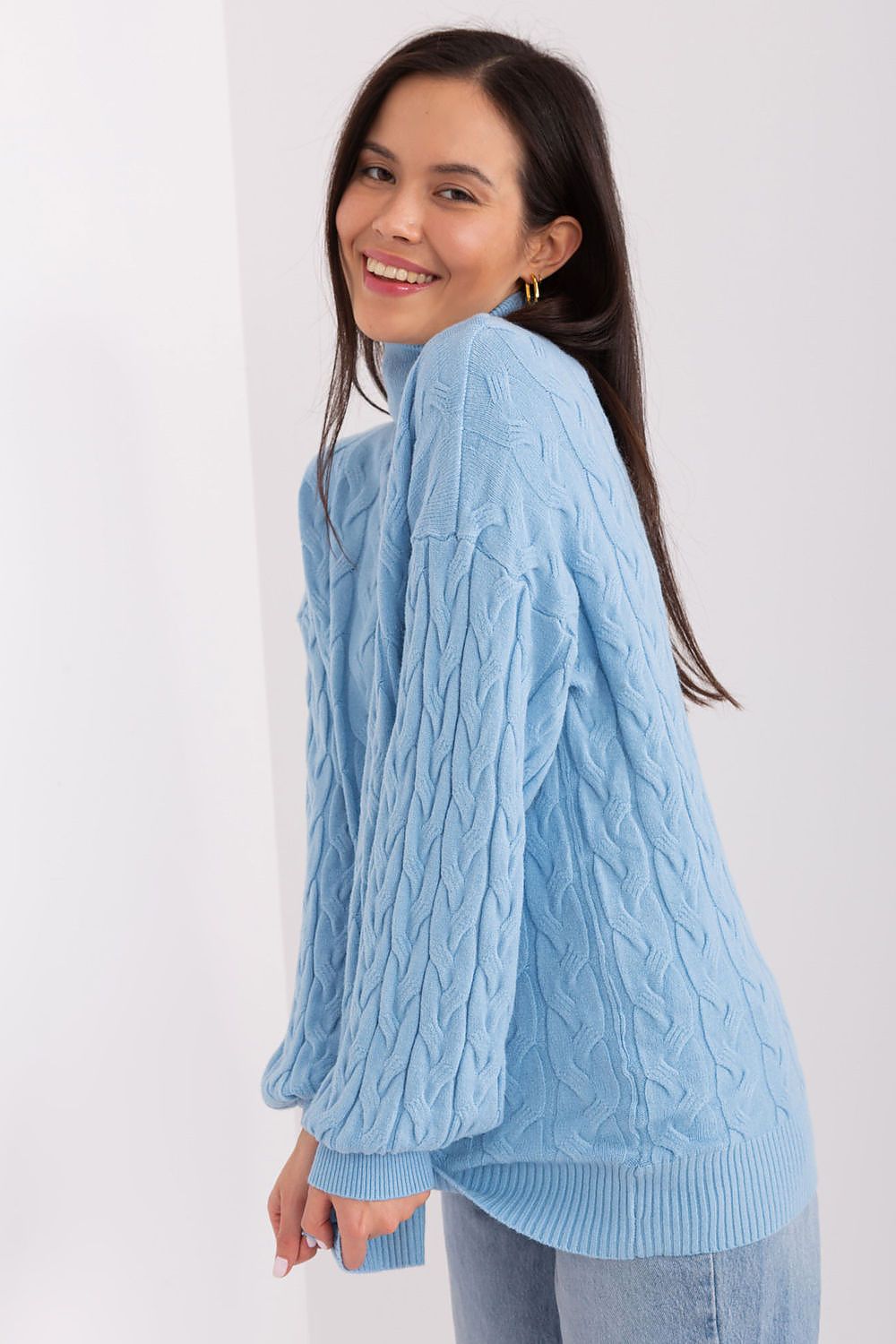 Sophisticated long sleeve women’s sweater by AT, combining comfort with an elegant plaid design.