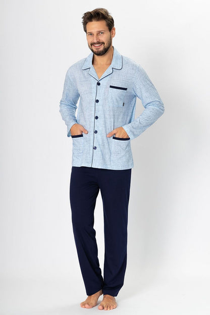 Lifestyle image of a man wearing M-Max luxury cotton pyjamas, exhibiting a modern loose fit and sophisticated style for evening or weekend wear.