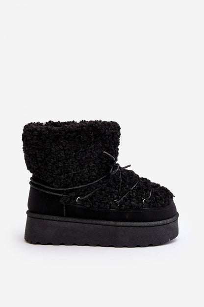 Stylish close-up of Step in Style Women's Snow Boots showcasing ecological leather and plush fur, designed for optimal warmth in cold weather.