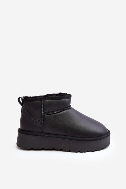 Stylish display of Step in Style luxury women's snow boots, highlighting the chic rubber platform and elegant design suited for winter outings.
