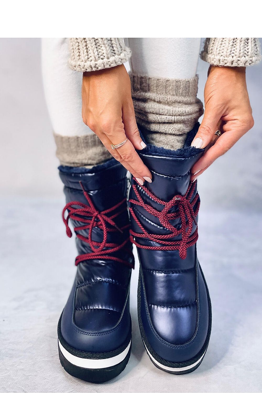 Luxury Inello Women's Snow Boots featuring thick fur insulation and 3.5cm high ecological leather sole, offering stylish warmth for winter adventures.