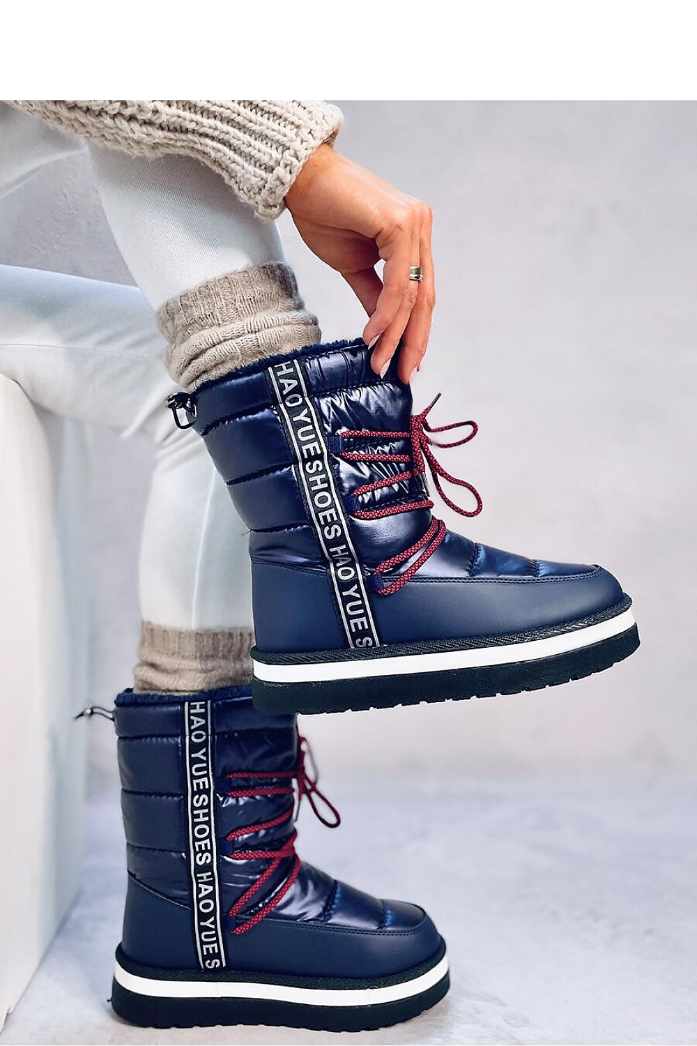 Elegant Inello Women's Snow Boots designed with premium ecological leather and plush fur lining, perfect for enduring cold weather in style.