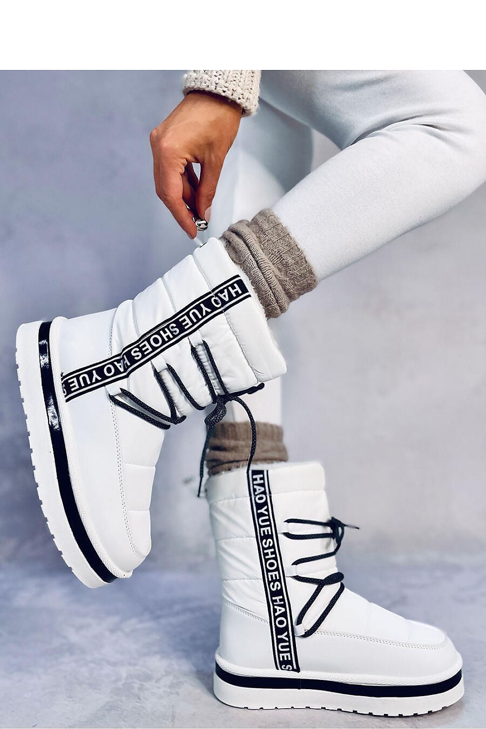 Elegant Inello Women's Snow Boots made from ecological leather with thick fur insulation, featuring a luxurious 3.5cm sole height, perfect for winter comfort and style.