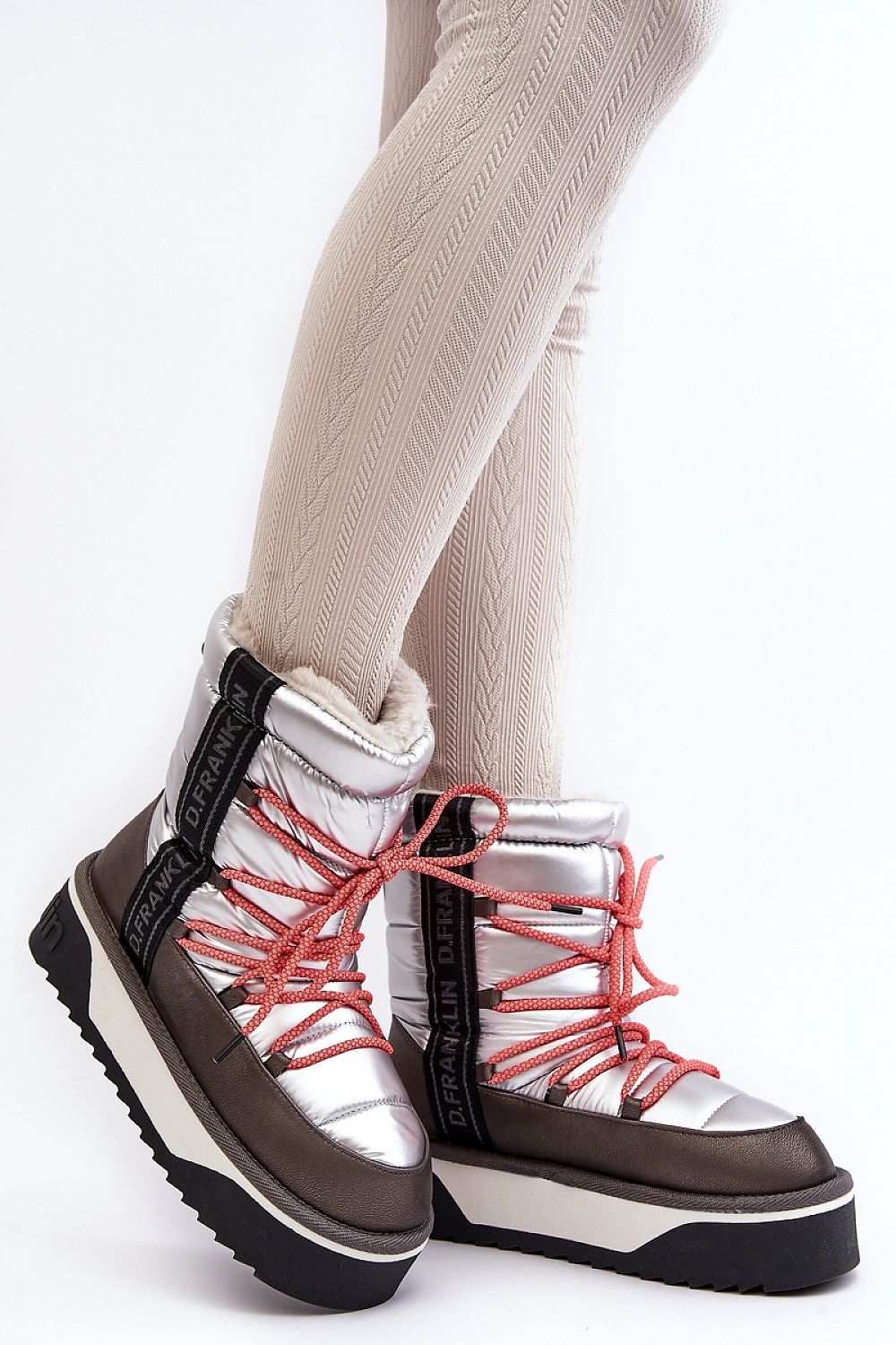 Step in Style's luxury vegan snow boots showcasing a non-slip sole and luxurious faux fur lining, perfect for winter elegance.