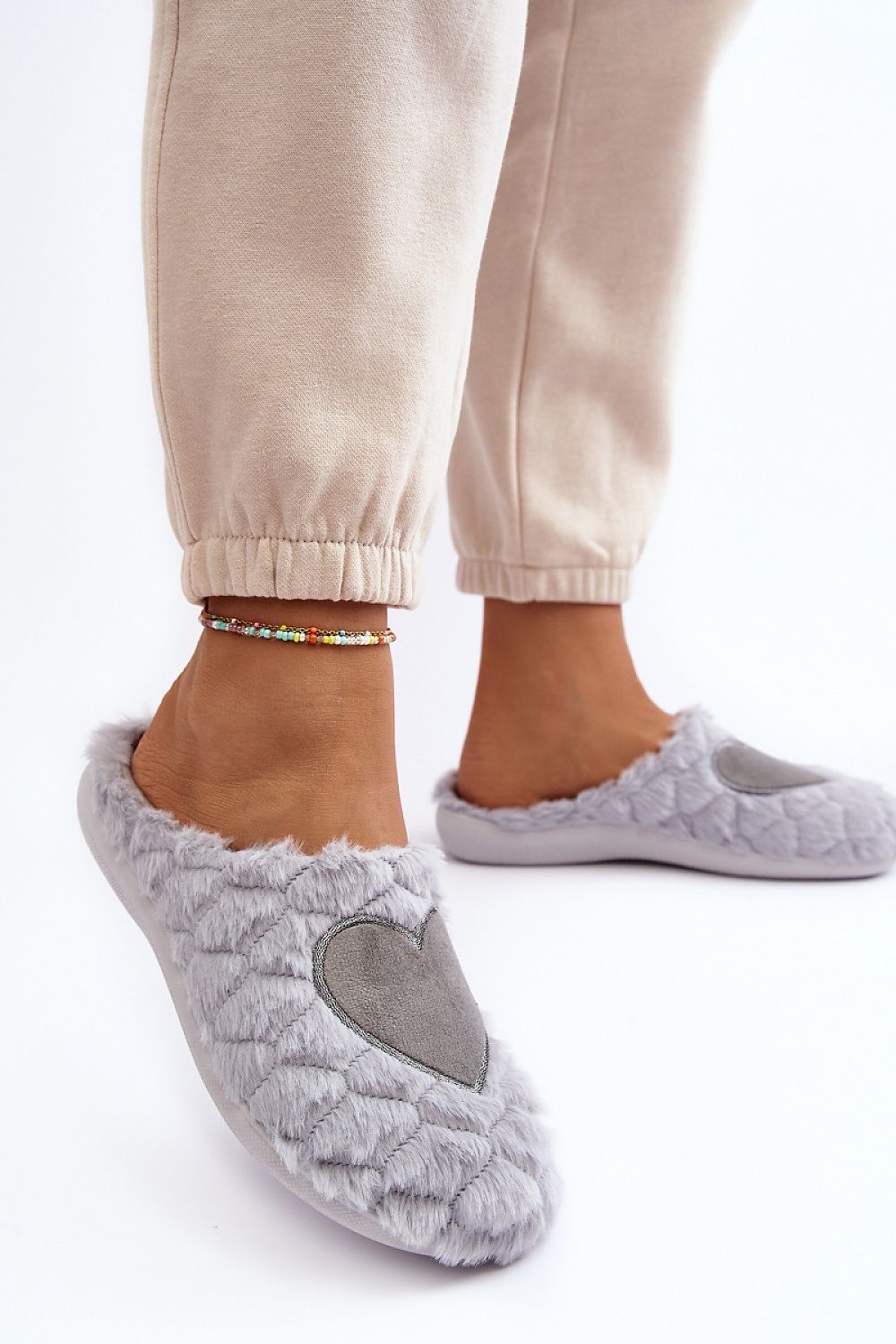 Luxury INBLU grey slippers for sensitive feet, featuring a cozy textured design and heart motif, perfect for ultimate comfort by Step in Style.