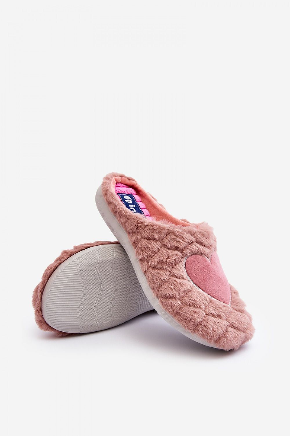 Fashionable luxury INBLU pink slippers showcasing a heart design and flexible sole, ideal for sensitive feet, from Step in Style.