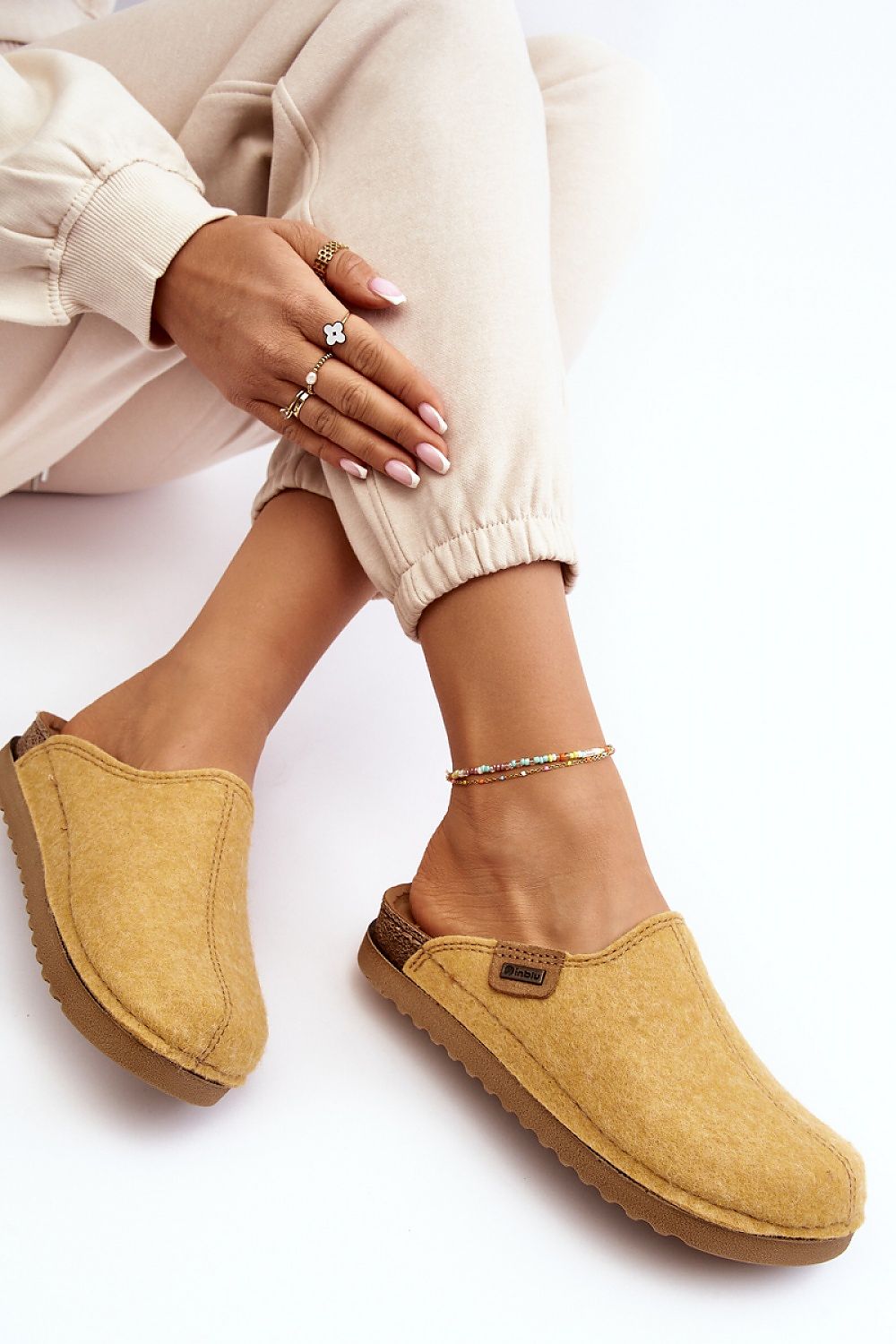 Step in style women's textile home slippers, elegantly designed for sensitive feet with a natural leather insole and 2 cm sole height.