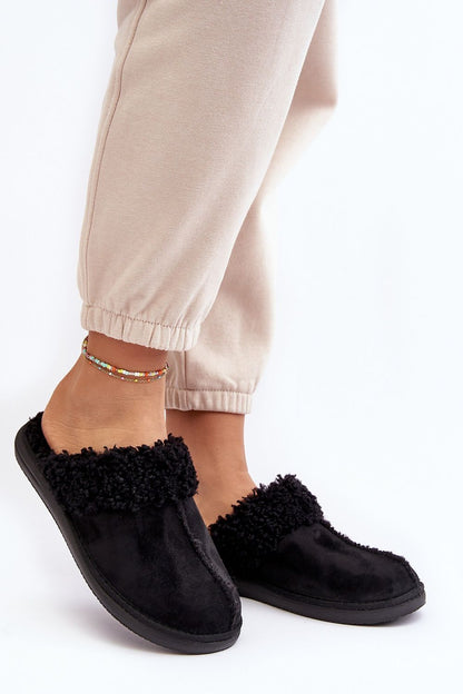 Step in Style luxurious women's fur-insulated slippers featuring a durable rubber sole, perfect for adding warmth and elegance to chilly evenings.