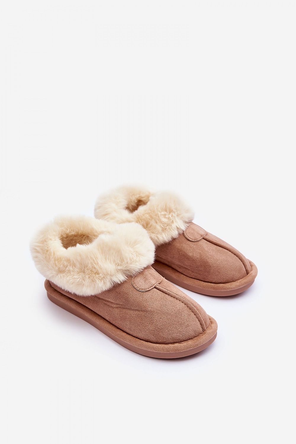 Step in Style's luxurious slip-on slippers featuring soft fur lining and a non-slip sole, designed for warm comfort at home.
