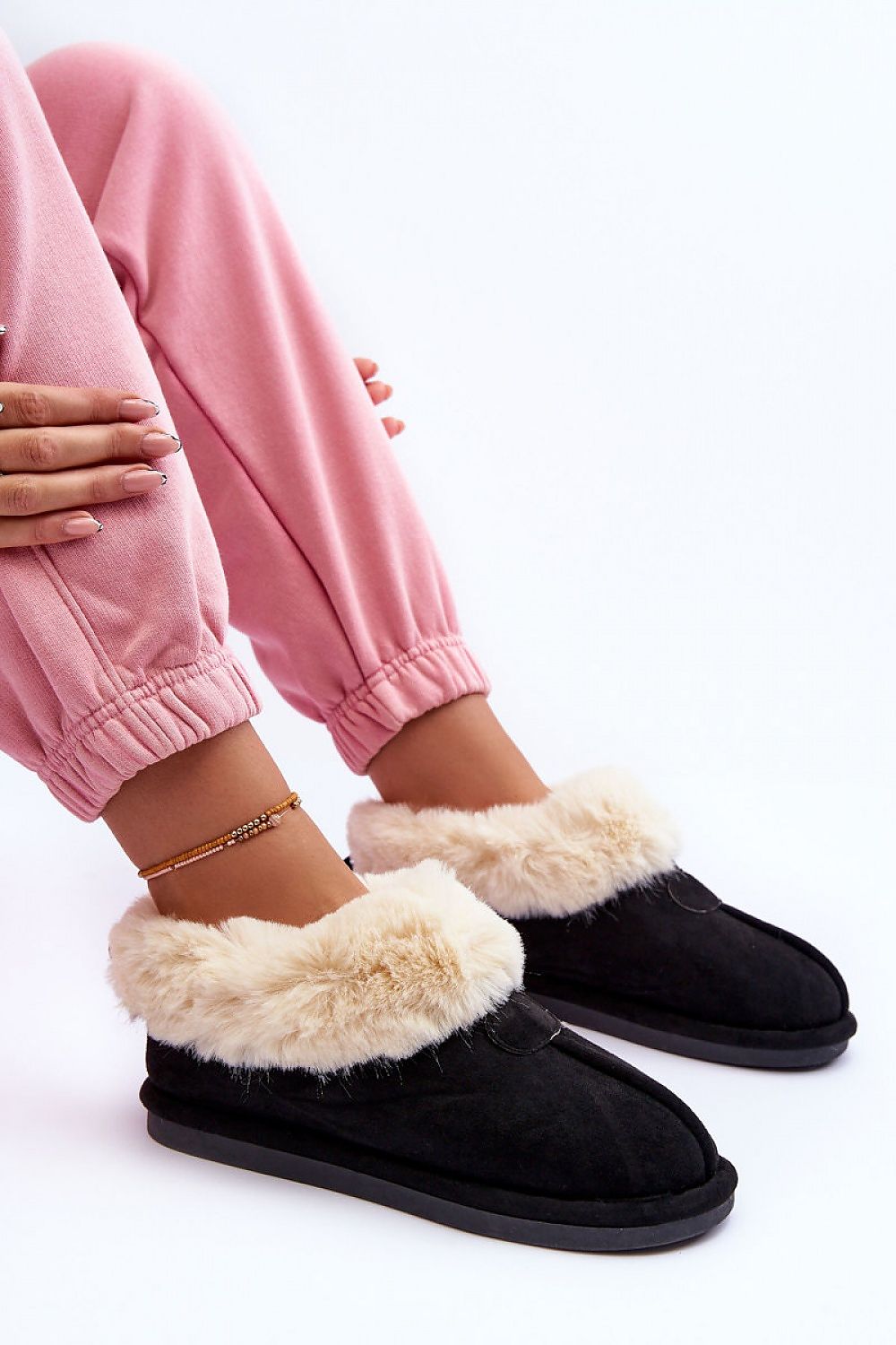 Chic non-slip slippers from Step in Style, crafted from eco suede and featuring a thick fur lining for exceptional warmth and style.