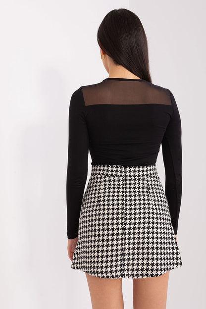 Elegant Lakerta Mini Skirt showcasing exquisite peptique pattern, perfect for luxurious occasions.