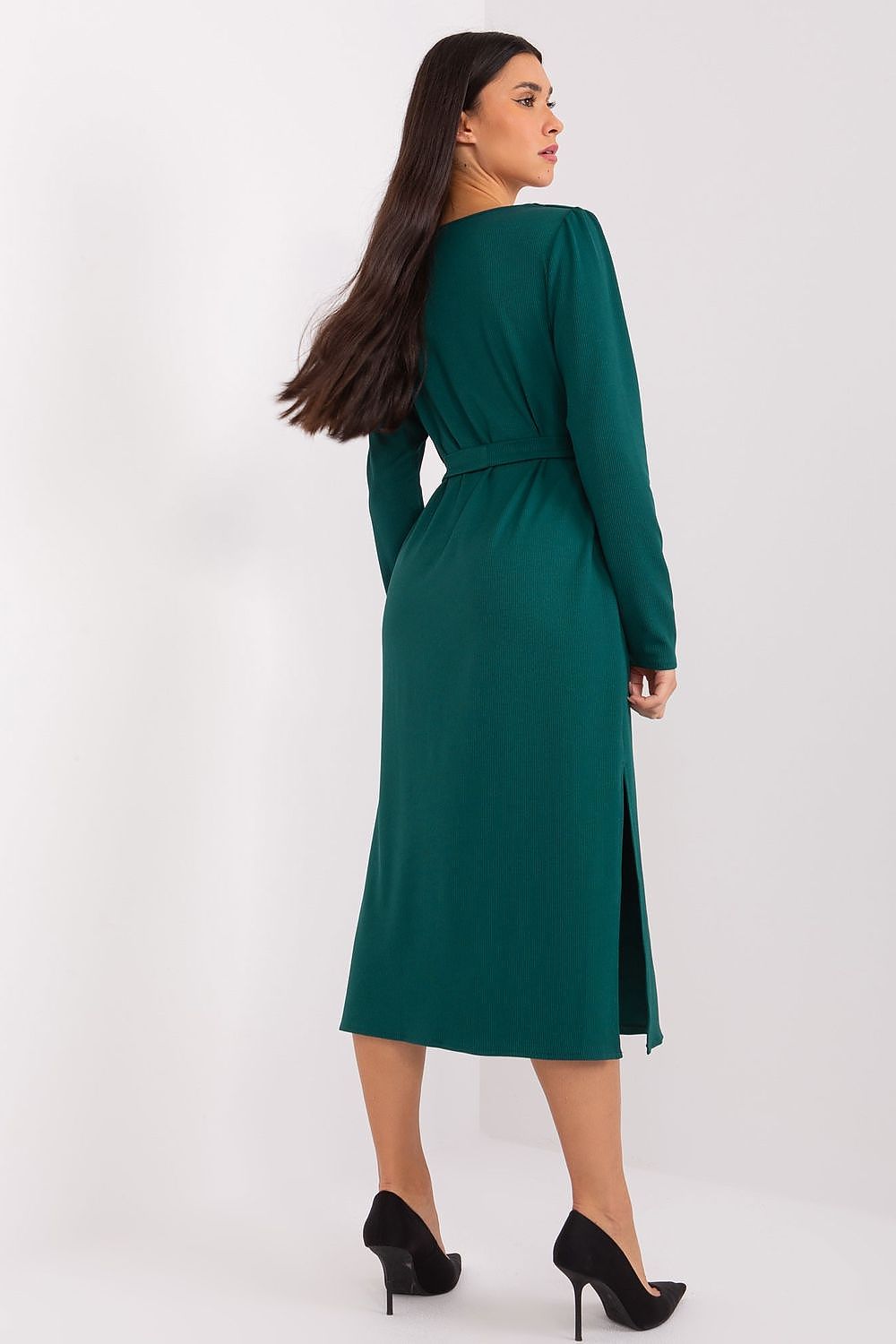 Lakerta elegant midi dress showcasing a unique cutout design and luxurious ribbed texture, perfect for sophisticated occasions.
