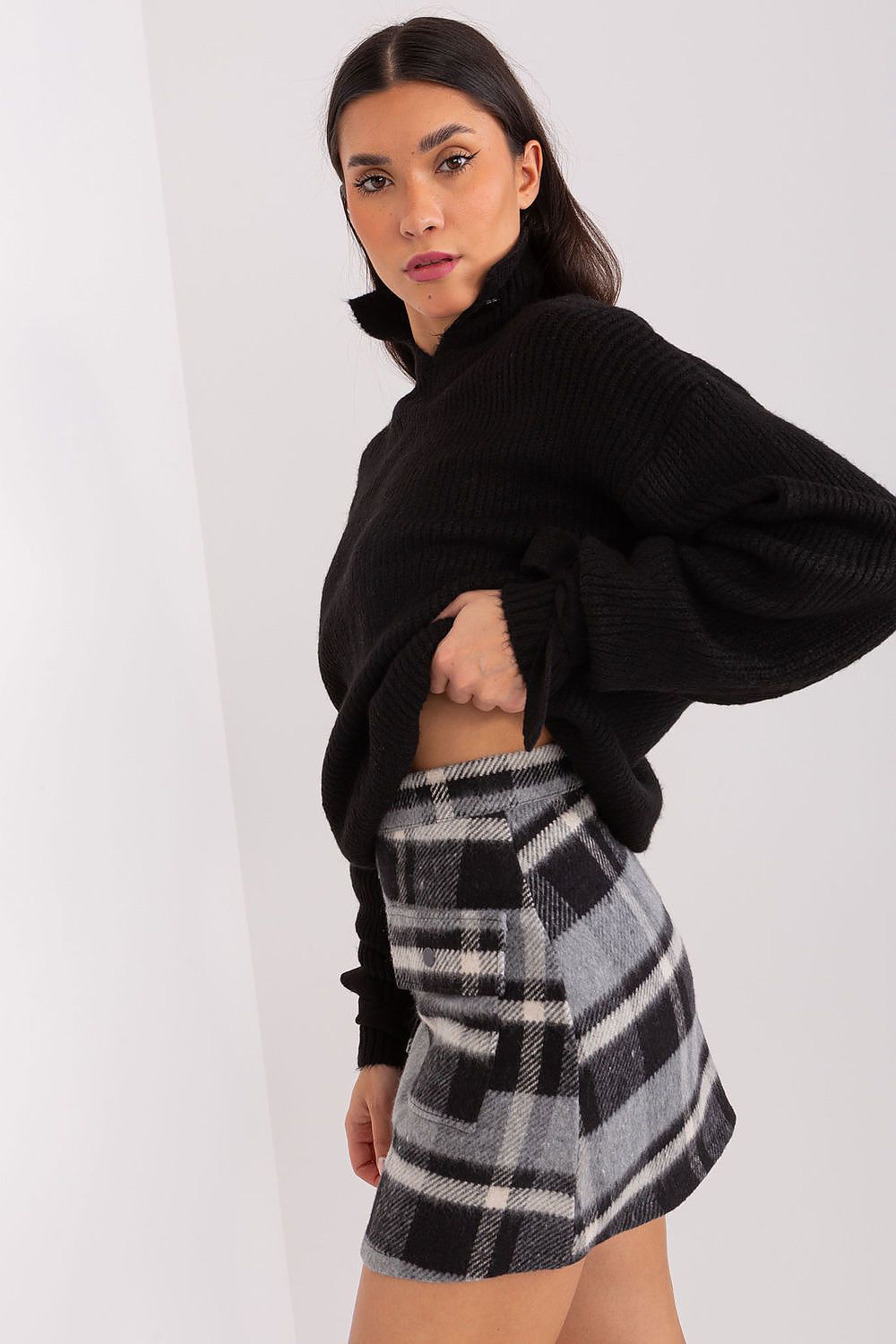 Elegant Checkered Mini Skirt by Lakerta showcasing a stylish wool blend design with practical pockets, ideal for versatile occasions.