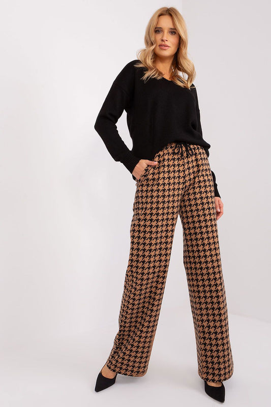 High-waisted Lakerta women's trousers in pepite pattern featuring a stylish waist tie and wide leg design, perfect for casual elegance.