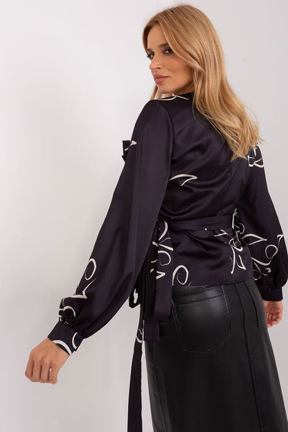 Stylish Luxury Lakerta formal blouse featuring an elegant envelope front and heart neckline, designed with intricate patterned fabric for a sophisticated look.