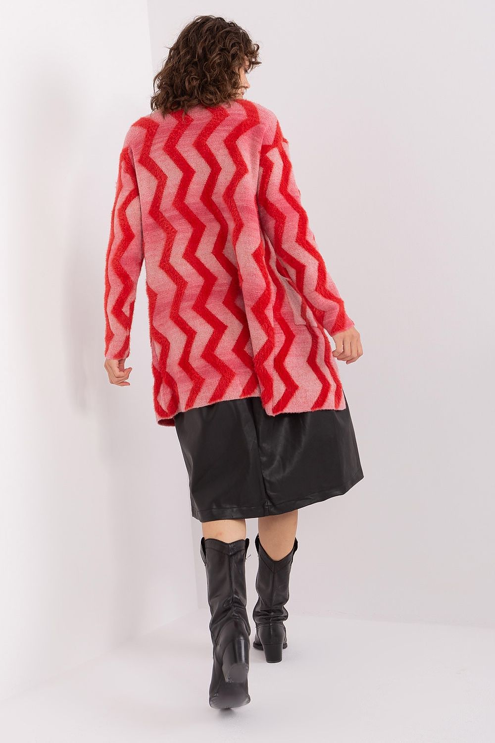 Model wearing the Geometric Pattern Long Sleeve Cardigan by AT, exemplifying how this versatile layer enhances a chic and fashionable look.