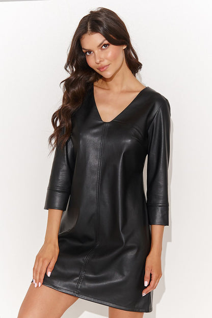 Elegant black eco-leather daydress by Numinou featuring 3/4 sleeves and a chic heart neckline, perfect for various occasions.