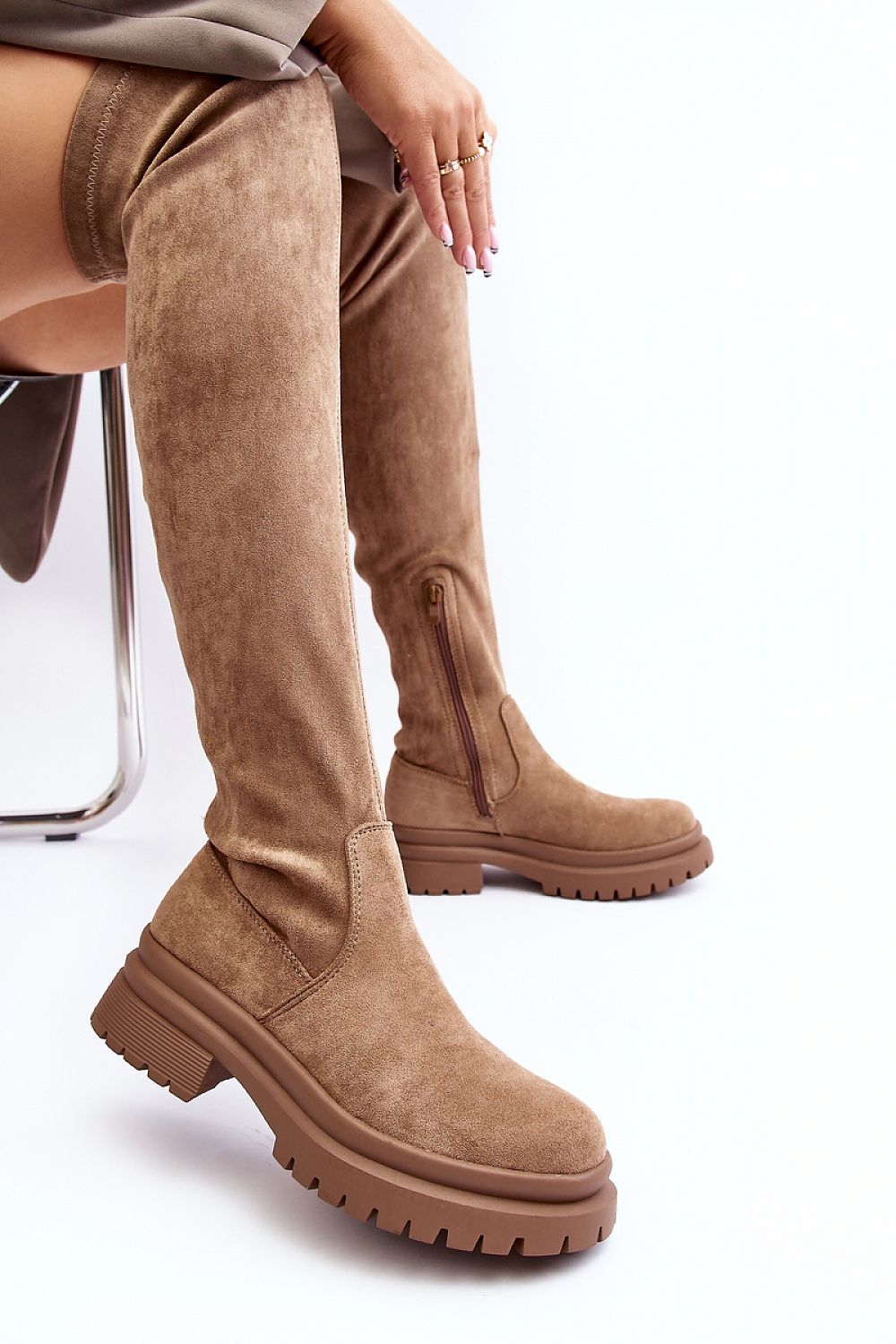 Stylish women's thigh-high boots made from eco-suede by Step in Style, designed with a rounded toe and classic cut, ideal for chic winter outfits.