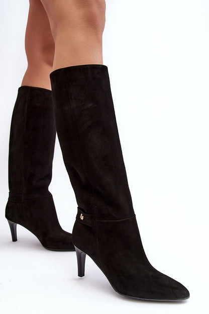 Elegant Laura Messi suede heel boots featuring a slip-on design, almond toe, and low stiletto heel, blending comfort and luxury.