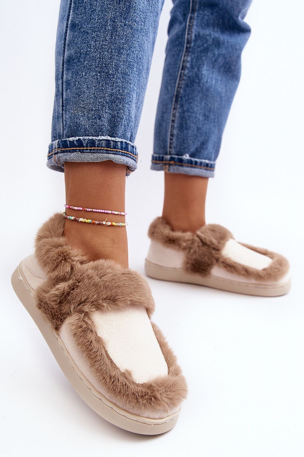 Elegant luxury eco-suede slippers with thick fur lining, showcased on a model wearing stylish denim. Perfect for ultimate comfort by Step in Style.