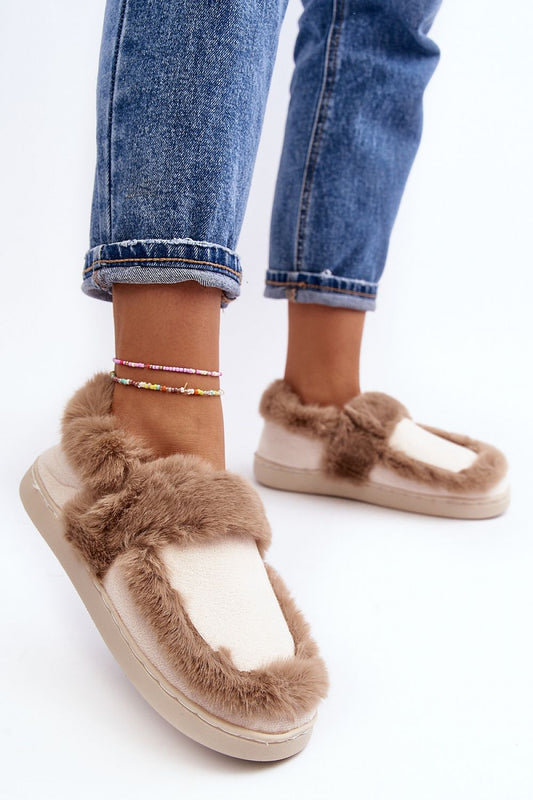 Elegant luxury eco-suede slippers with thick fur lining, showcased on a model wearing stylish denim. Perfect for ultimate comfort by Step in Style.