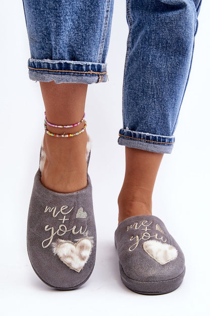 Step in Style's luxurious shiny slippers for women, showcasing a trendy heart inscription and featuring a cozy fur insulated footbed.