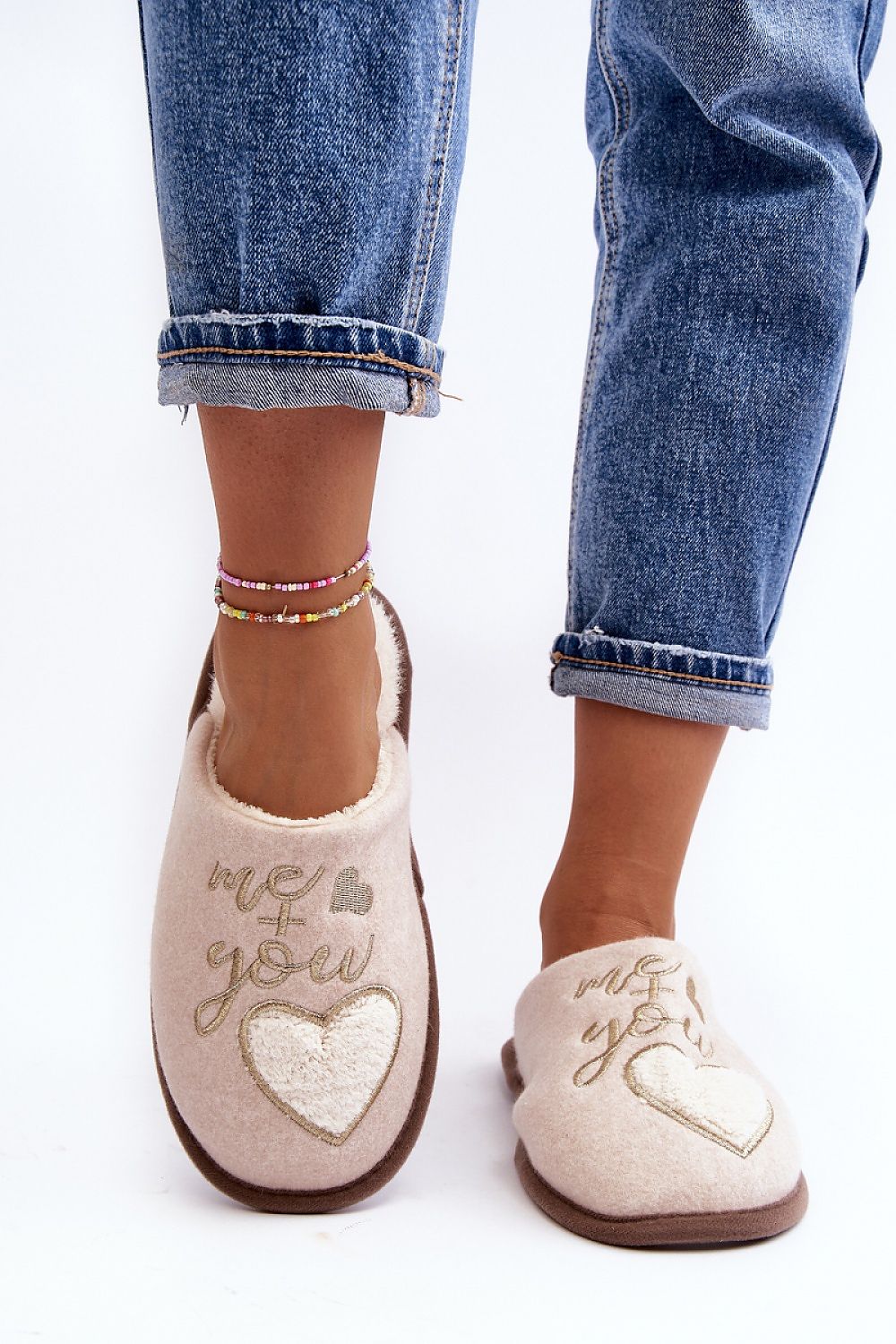 Chic Women's Classic Slippers from Step in Style showcasing plush fur insulation for a cozy feel during winter.