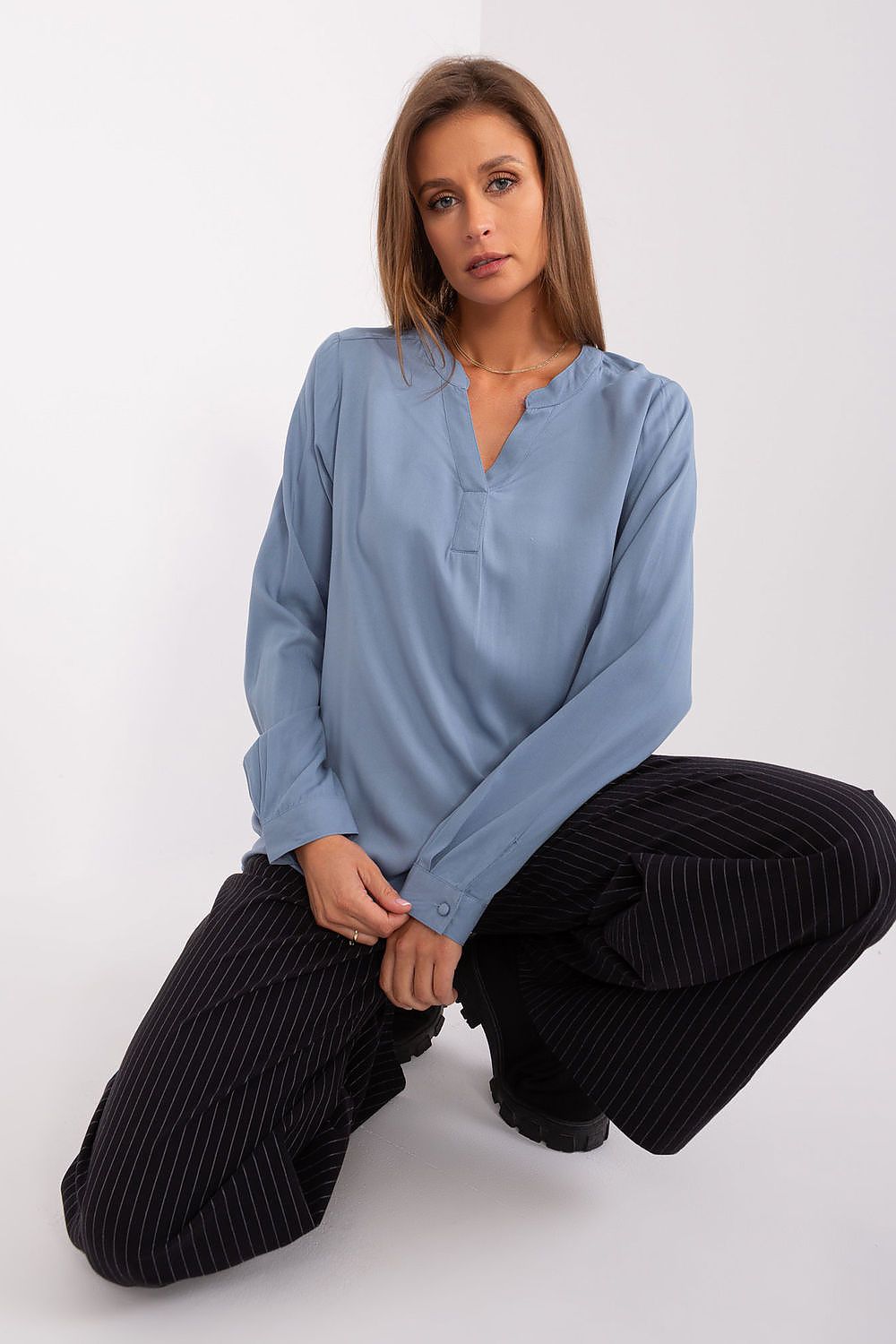 Chic Sublevel Casual Blouse in high-quality viscose, ideal for casual and professional occasions with its refined V-neck and versatile long sleeves.