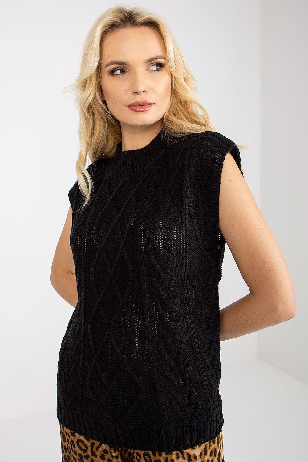 Stylish Sublevel sleeveless knitted jacket with chic plaid detail, perfect for high-end fashion looks.