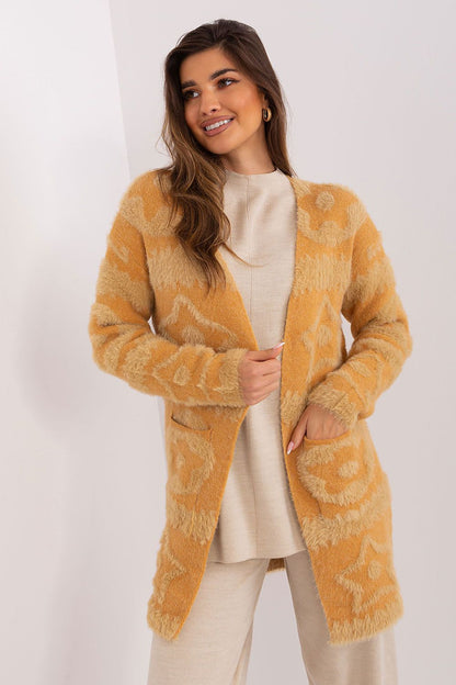 Comfortable long sleeve cardigan by AT with unique fabric textures, perfect for layering in cooler weather.