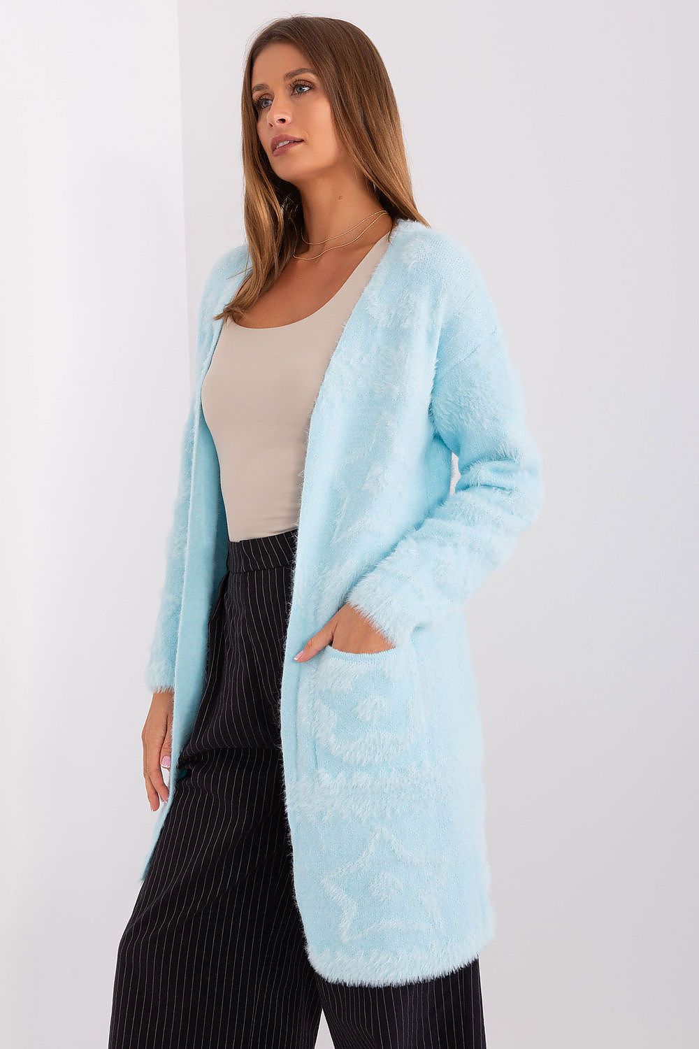 Elegant loose cut cardigan with long sleeves by AT, perfect for layering in sophisticated casual fashion.