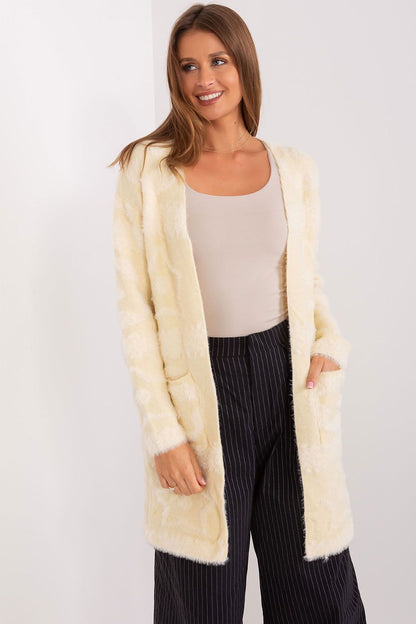 Beautiful textured fabric of the AT unbuttoned cardigan, ideal for adding warmth and style to any ensemble.