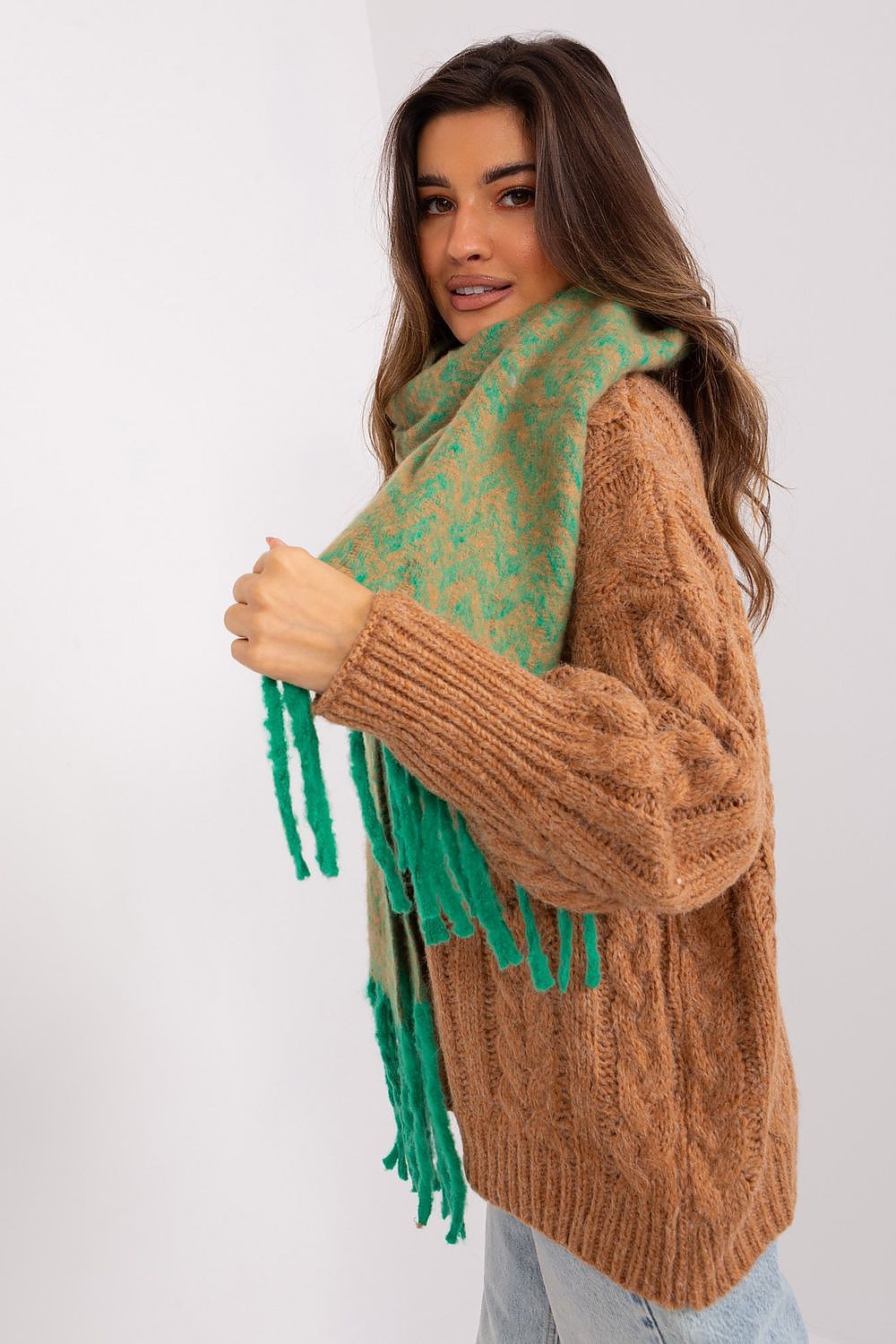Versatile long scarf by AT with trendy tassels, ideal for a blend of warmth and style in fall fashion.