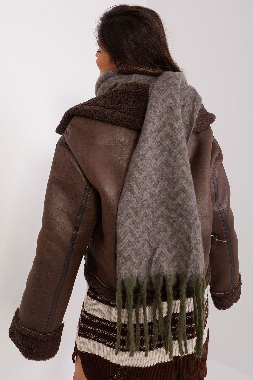 Fashionable long scarf by AT, featuring a stunning geometric motif and decorative tassels, designed for elegance and warmth.