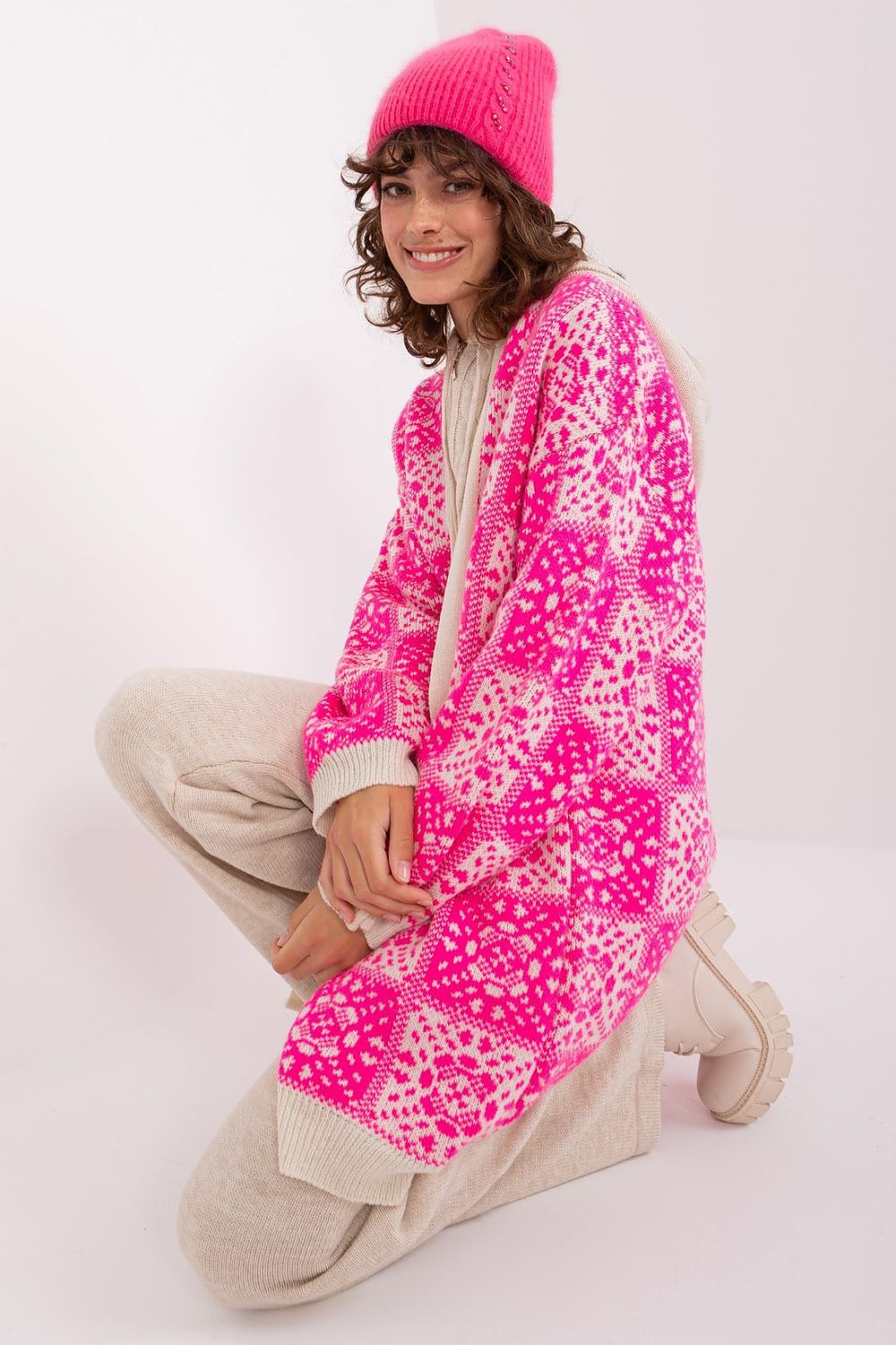 Stylish winter warm hat by AT, showcasing intricate braiding and an eye-catching front design, designed to provide warmth and elegance.