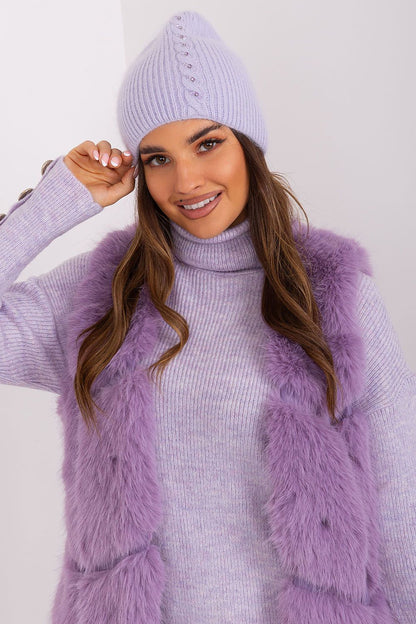 Beautifully styled winter hat by AT with a sophisticated braided pattern, perfect for cold weather, made with high-quality acrylic and angora.