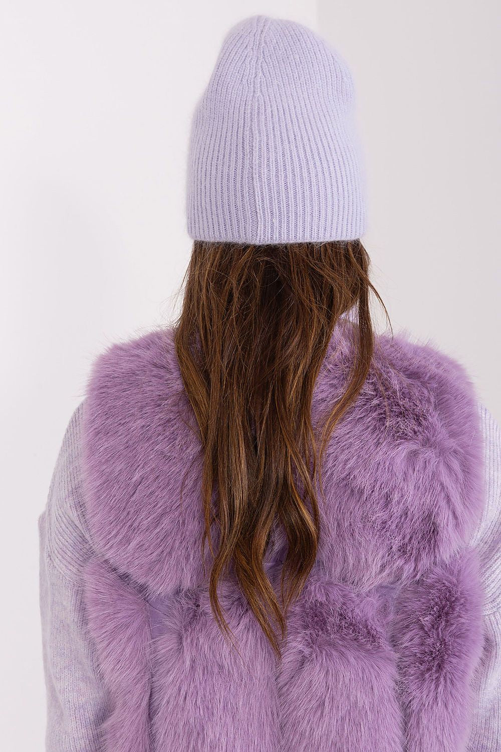 Elegant winter warm hat by AT featuring a sophisticated braided pattern and unique front application. Perfect for adding luxury to your winter wardrobe.