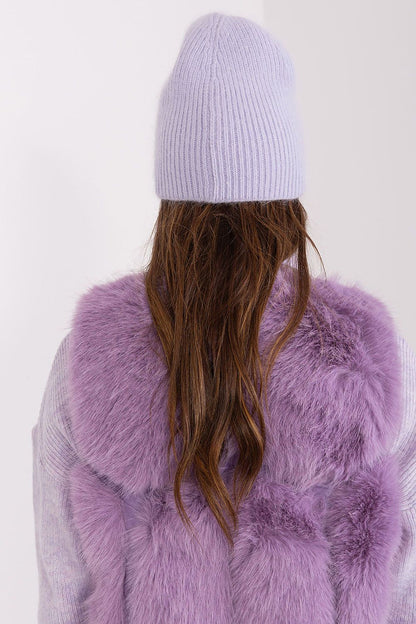 Elegant winter warm hat by AT featuring a sophisticated braided pattern and unique front application. Perfect for adding luxury to your winter wardrobe.