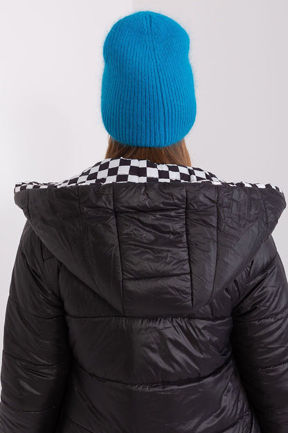 Elegant winter warm hat by AT with a sophisticated braided pattern, crafted from 60% acrylic and 40% angora.