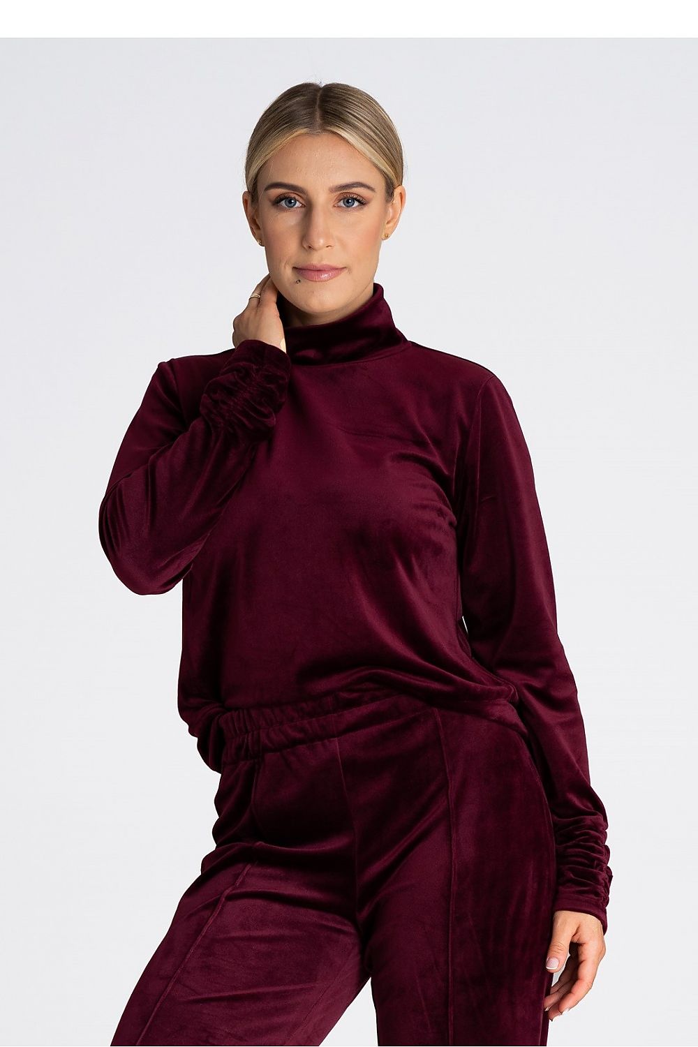 Stylish women's velour turtleneck sweatshirt by Figl, perfect for casual elegance with its comfortable long sleeves.
